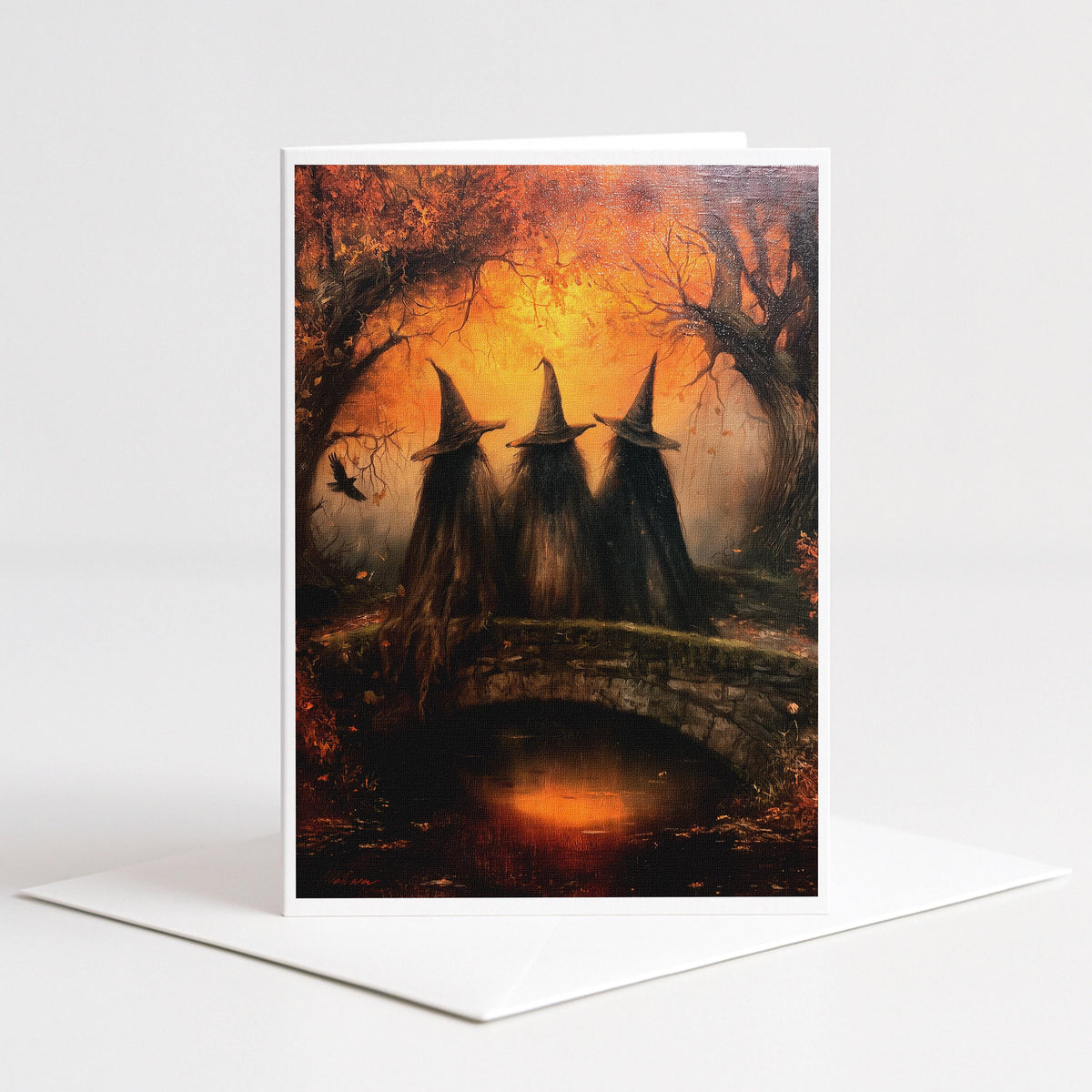Three witches on an old stone bridge under a glowing autumn forest, 5x7 blank note card