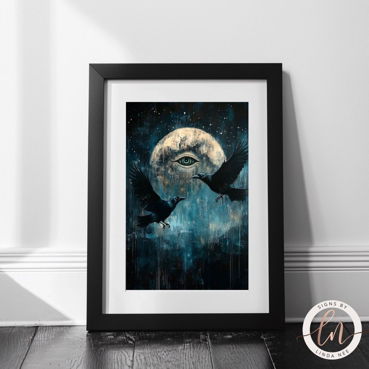 All seeing eye and ravens print shown against a dark blue night sky