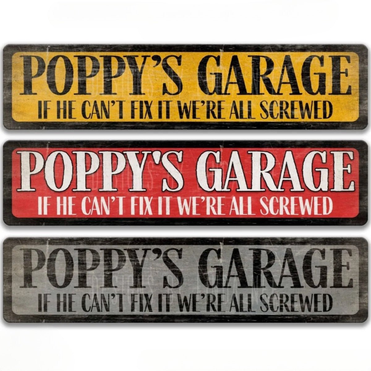 three signs with the same message, "POPPY'S GARAGE IF HE CAN'T FIX IT WE'RE ALL SCREWED". The signs are in different colors and sizes, and they are all rectangular in shape.