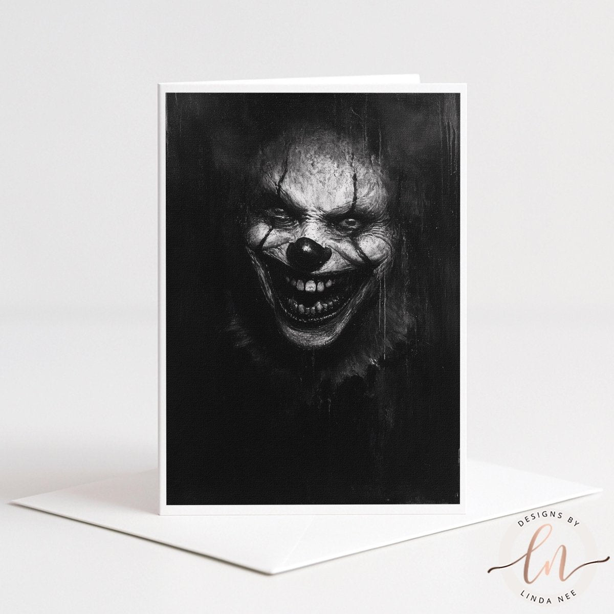 A creepy clown with a menacing expression and a wide, menacing smile is depicted in a black and white image.