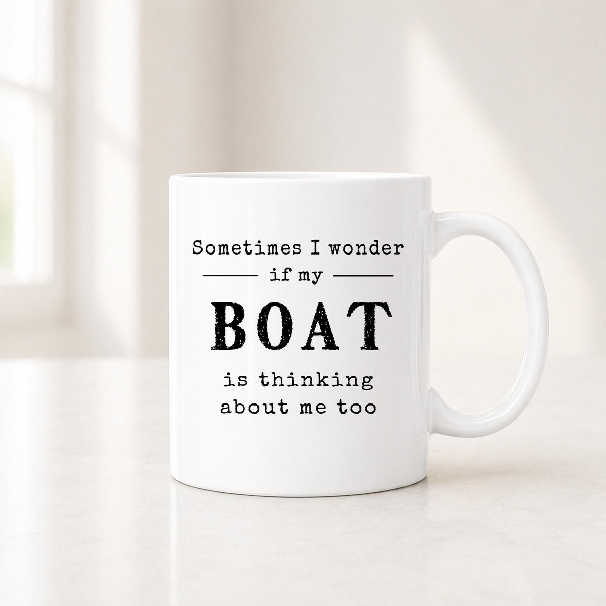 Second view of the white boat mug showing the black quote about wondering if my boat is thinking about me