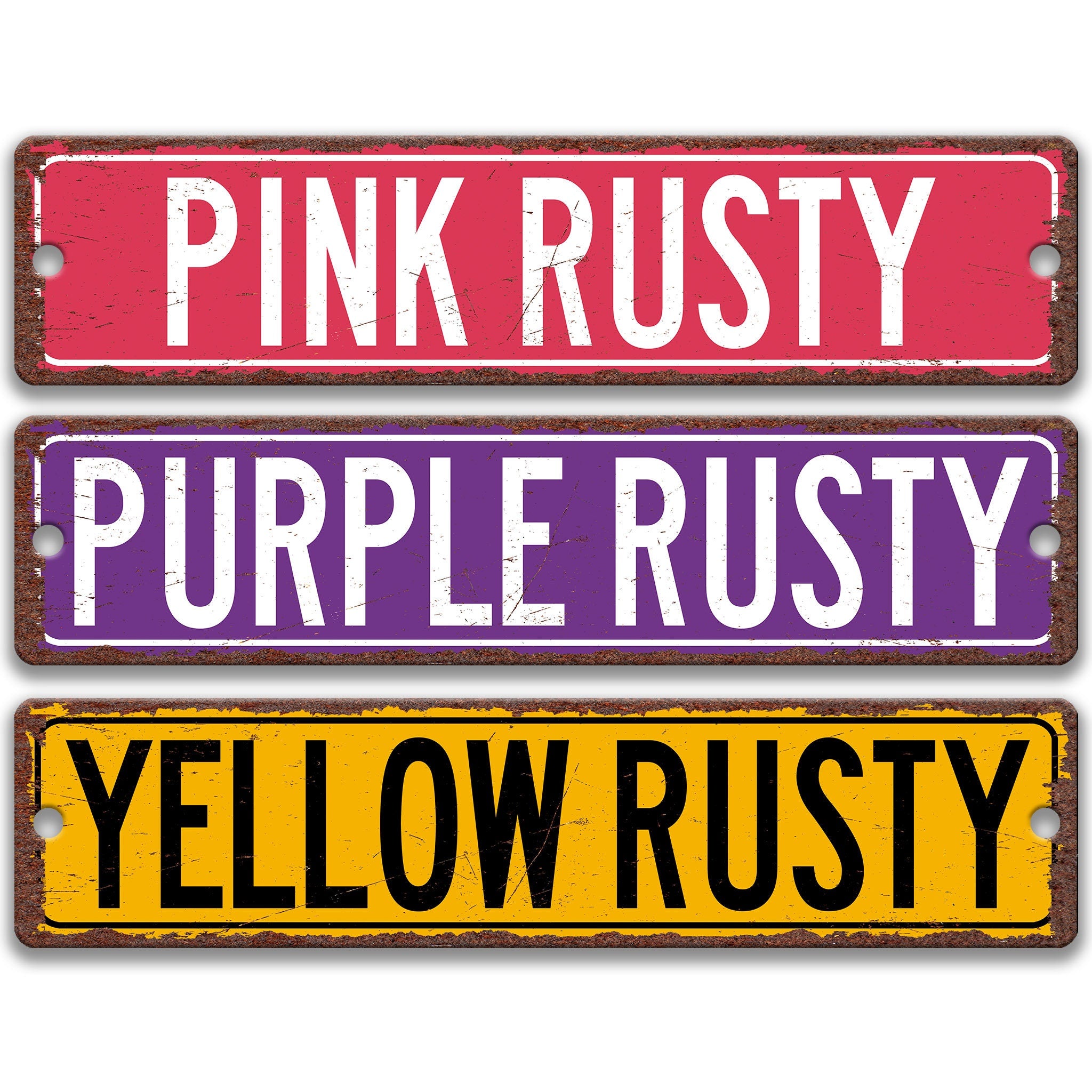three rectangular signs with the text "PINK RUSTY", "PURPLE RUSTY", and "YELLOW RUSTY" written on them.