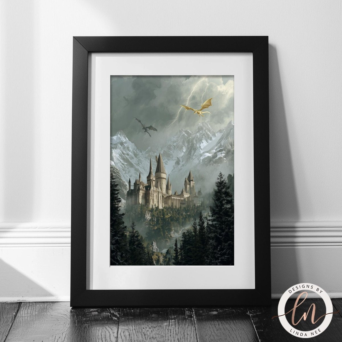A framed painting depicting a castle surrounded by a misty, mountainous landscape with a dragon flying overhead.