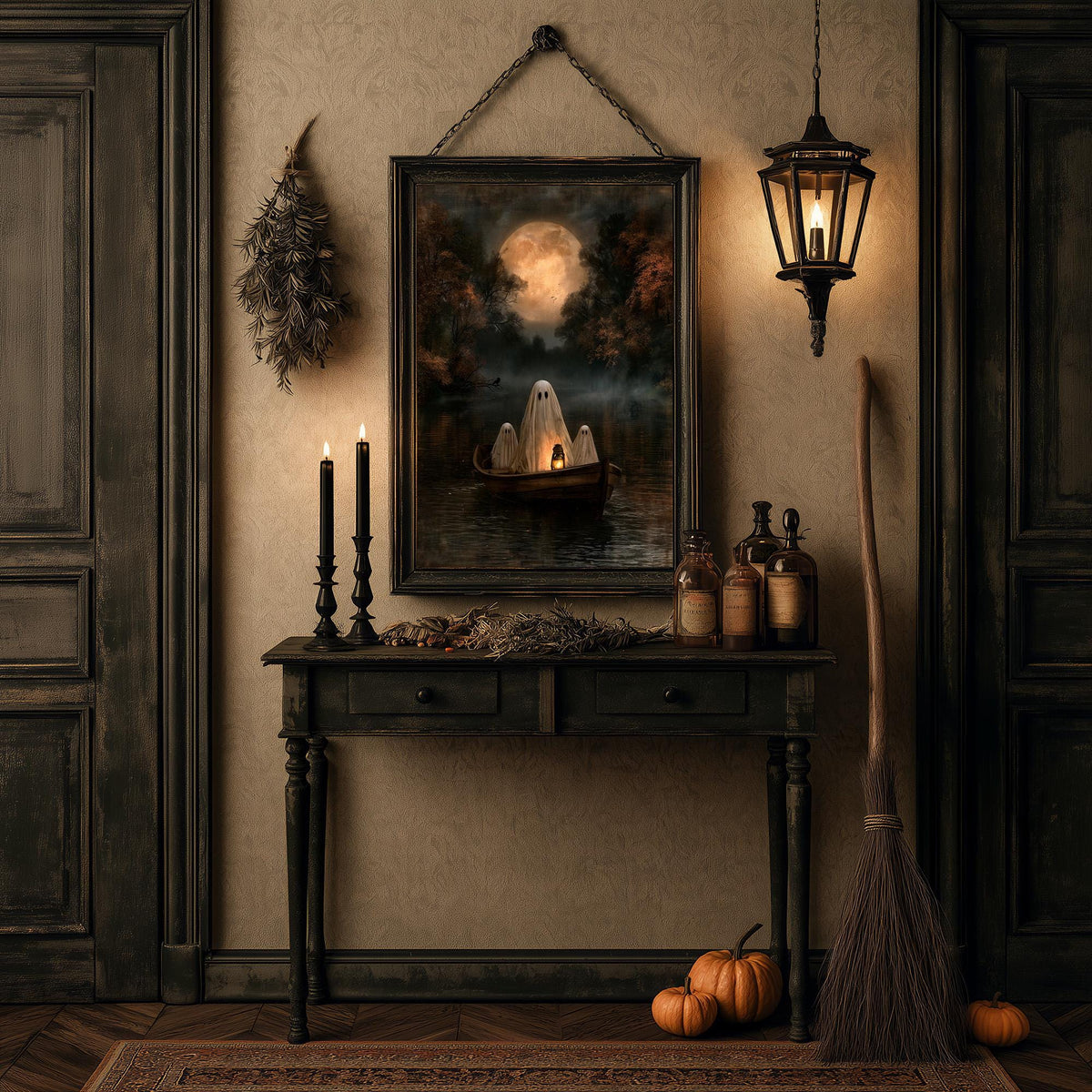 Halloween table of candles, bottles, pumpkins, and a broom under the ghost print
