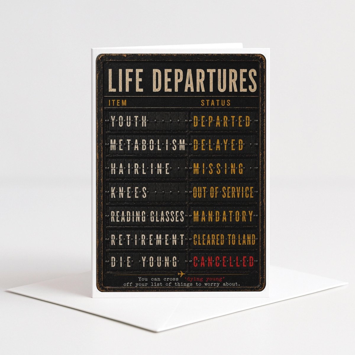 The image is a humorous life departures card that lists various departures and cancellations, such as youth metabolism delayed, missing, out of service, mandatory retirement, and dying young.