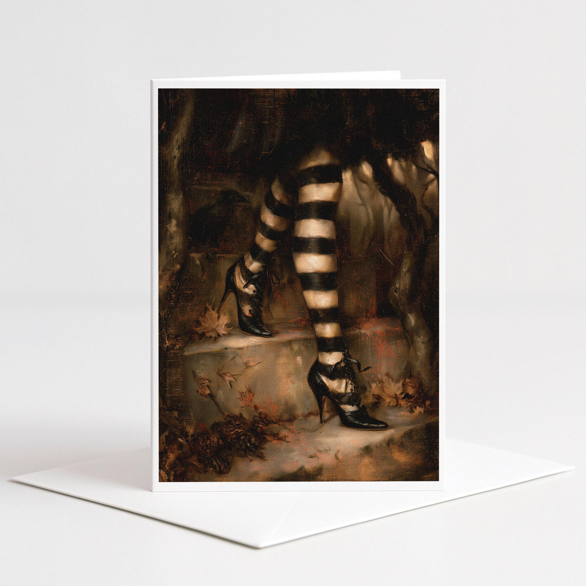 Striped witch stockings and black lace up heels in autumn leaves, 5x7 blank note card