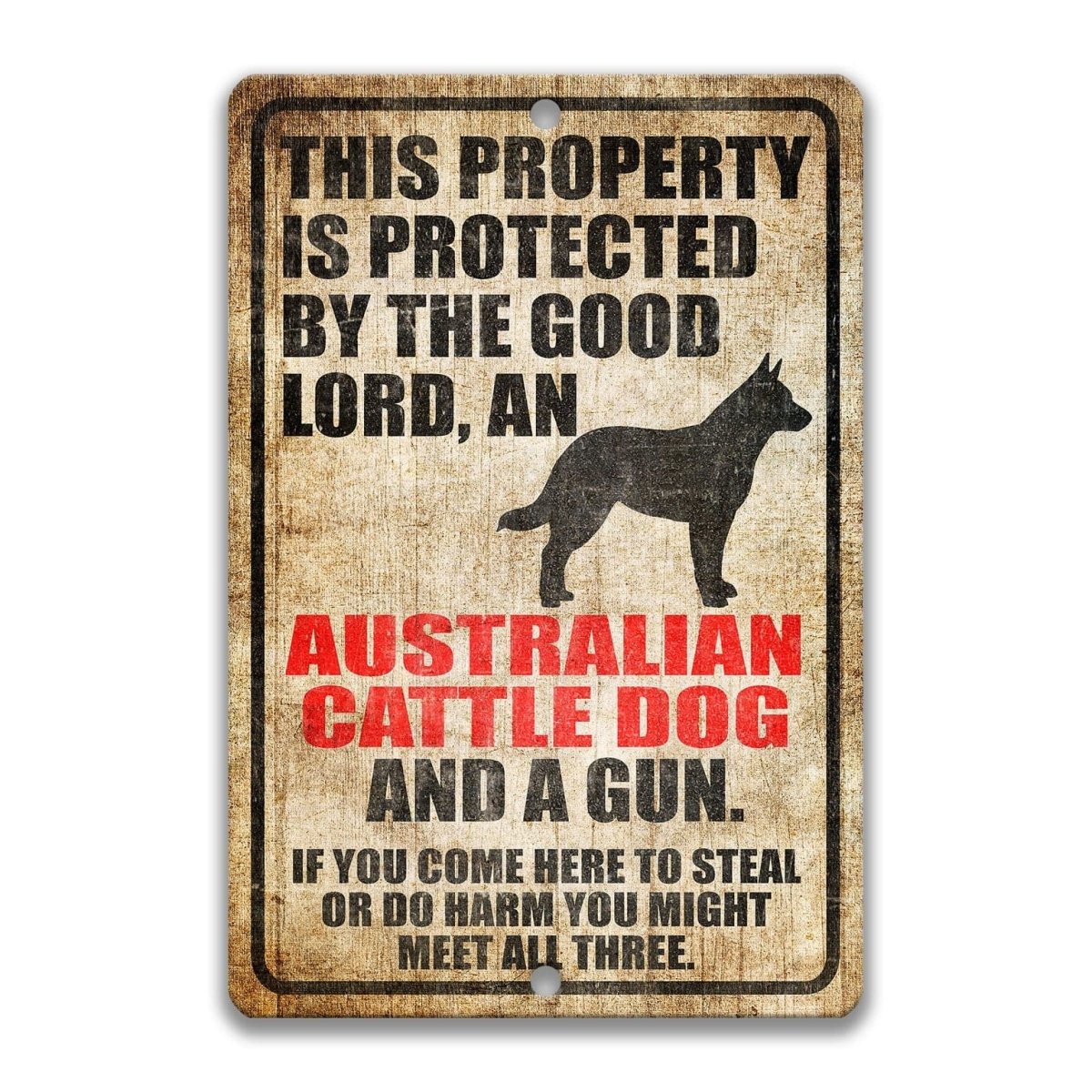 The image is a sign that warns people about the presence of an Australian Cattle Dog and a gun in the area.