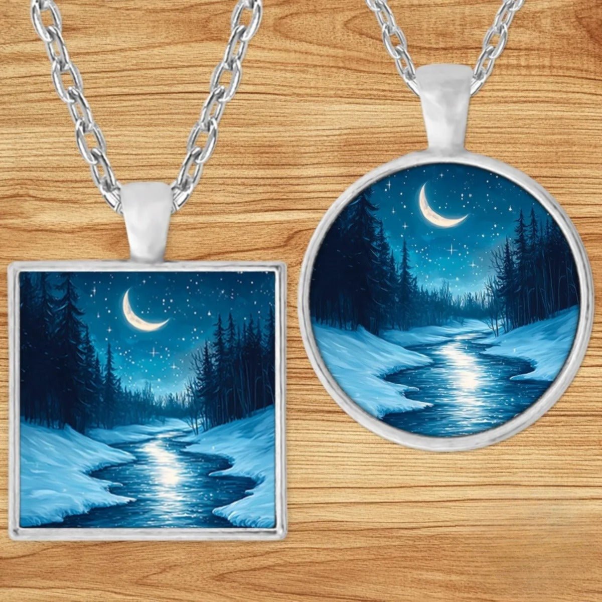 Starry Winter Forest pendant necklace shown in round and square silver charm styles on a wood background