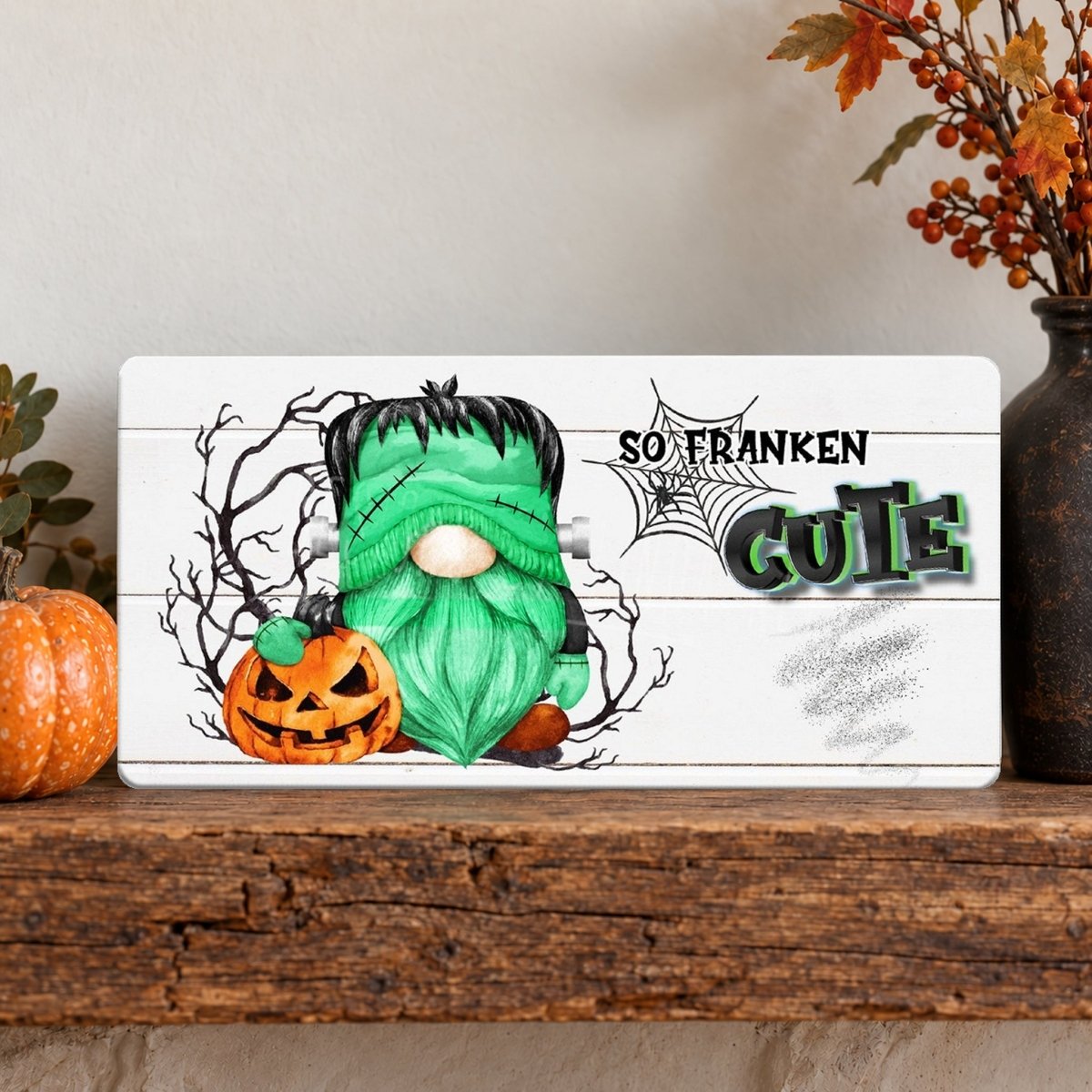 So Franken Cute sign on a shelf with fall decor
