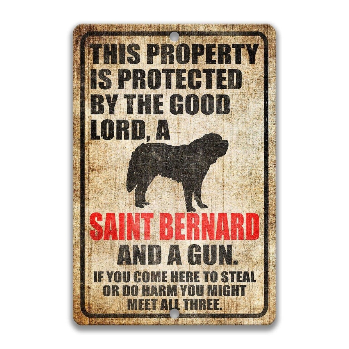 The image is a sign with a black silhouette of a dog and text that reads "This property is protected by the good Lord, a Saint Bernard and a gun. If you come here to steal or do harm you might meet all three."