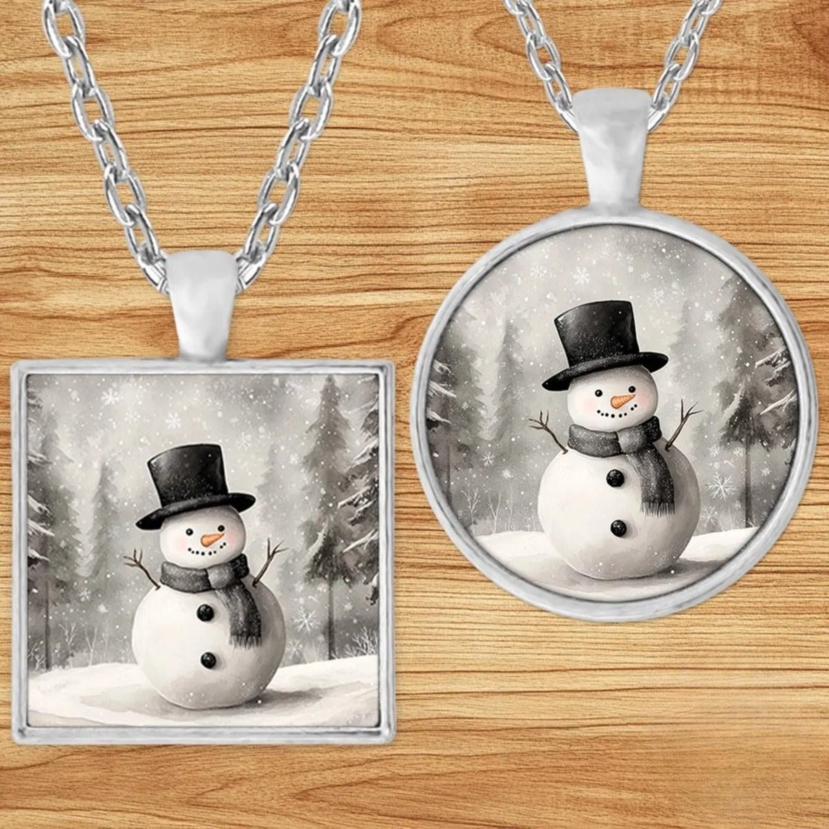 Vintage Top-Hat Snowman pendant necklace shown in round and square silver charm styles on a wood background