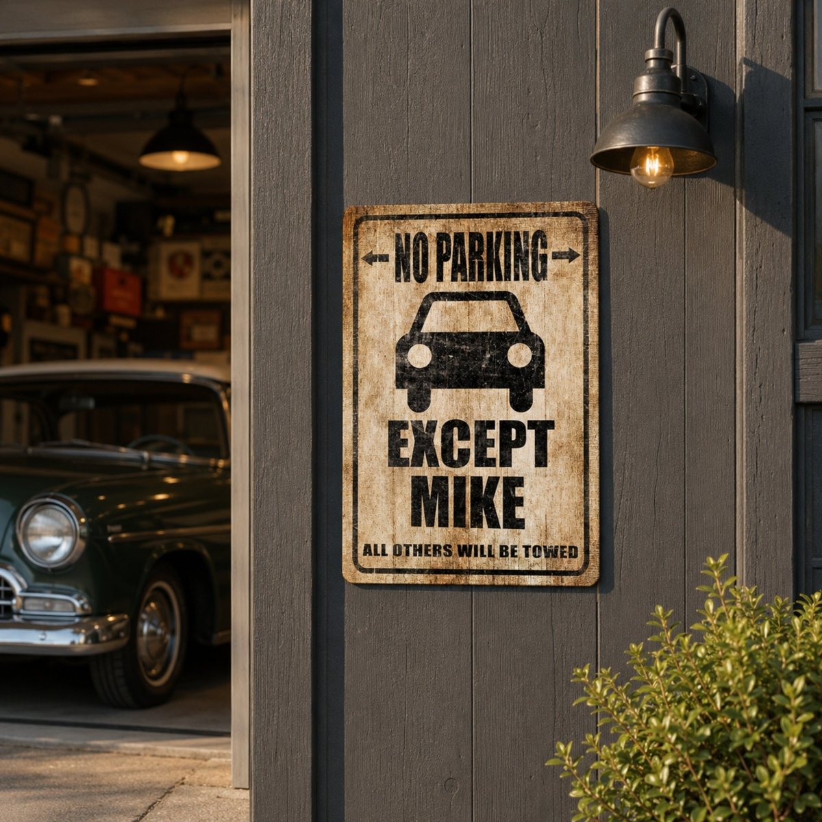 a vintage-style "No Parking" sign with a car icon, mounted on a wall next to a garage door.