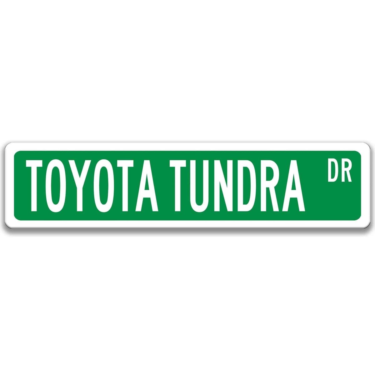 Green street sign with white border, white text reading TOYOTA TUNDRA DR