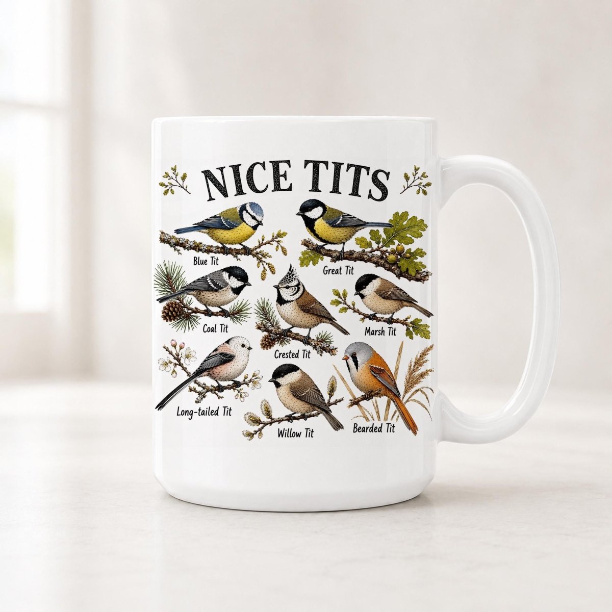 15 oz Nice Tits mug showing eight labeled tit species, including blue tit, great tit and bearded tit, on branches