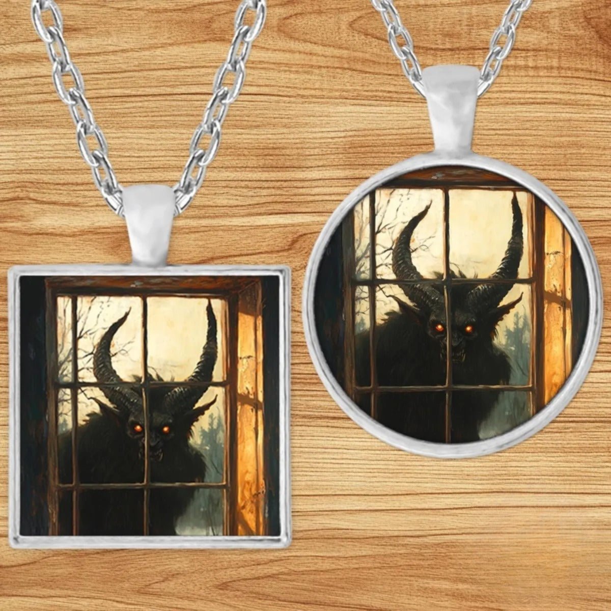 Krampus Gothic Christmas pendant necklace shown in round and square silver charm styles on a wood background