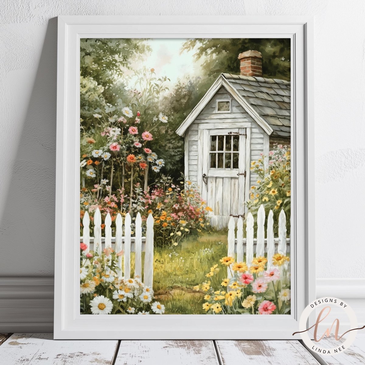 White cottage with a chimney surrounded by a colorful garden