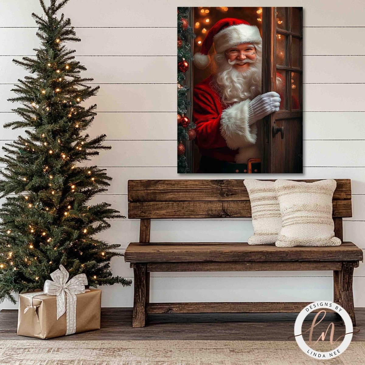 Santa peeking through window print above a wooden bench beside a lit tree