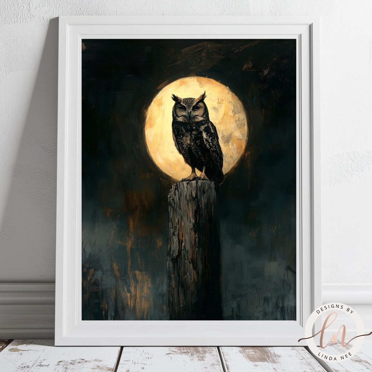 Owl and full moon artwork displayed in a gold ornate frame