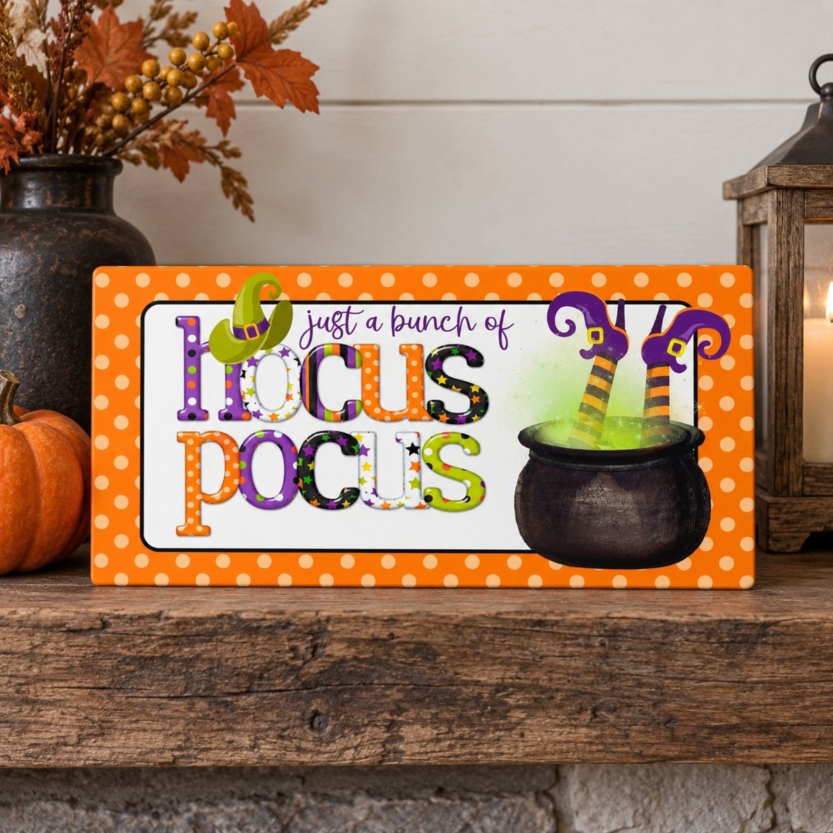 Just a Bunch of Hocus Pocus sign on a shelf with fall decor