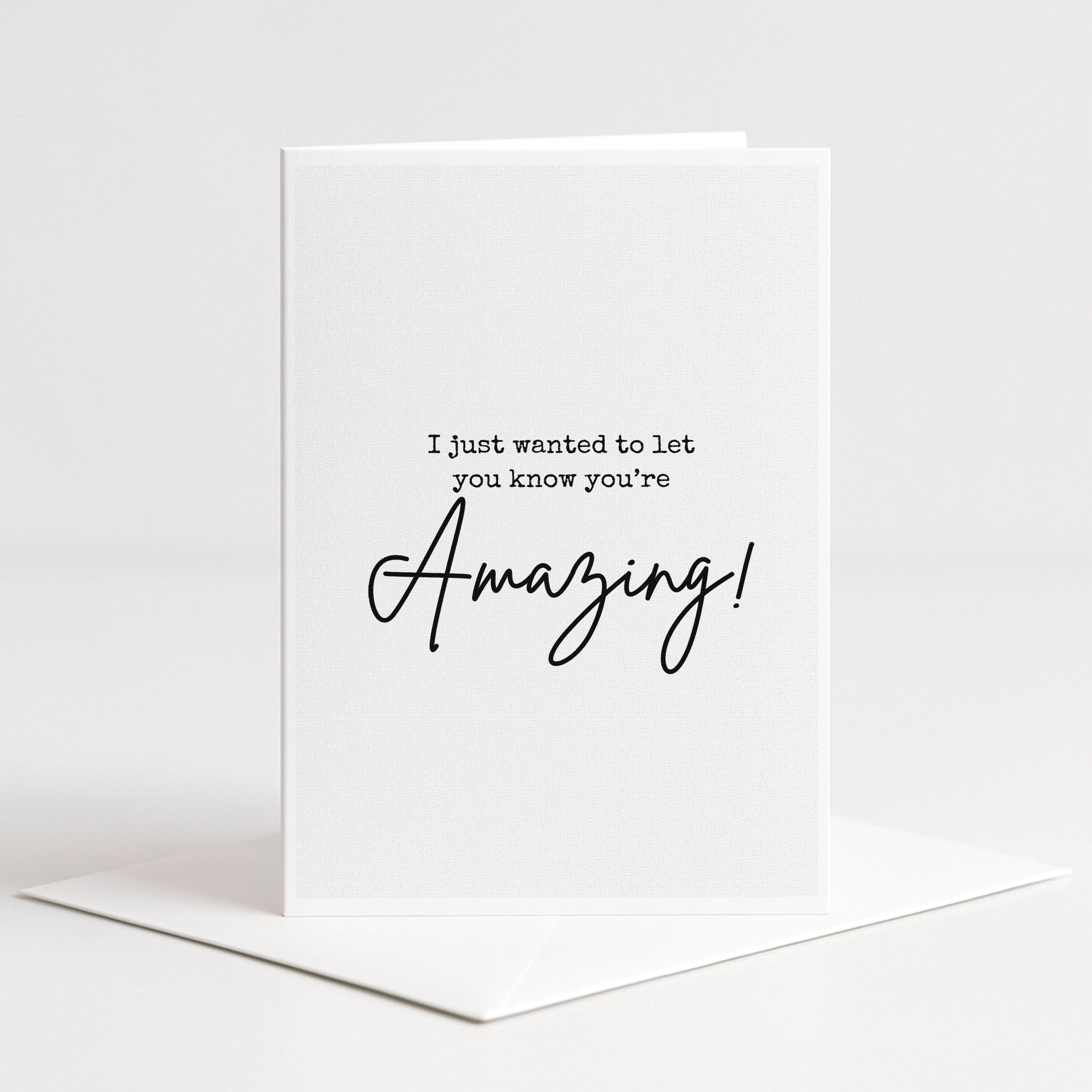 The image is a white card with a message written on it.