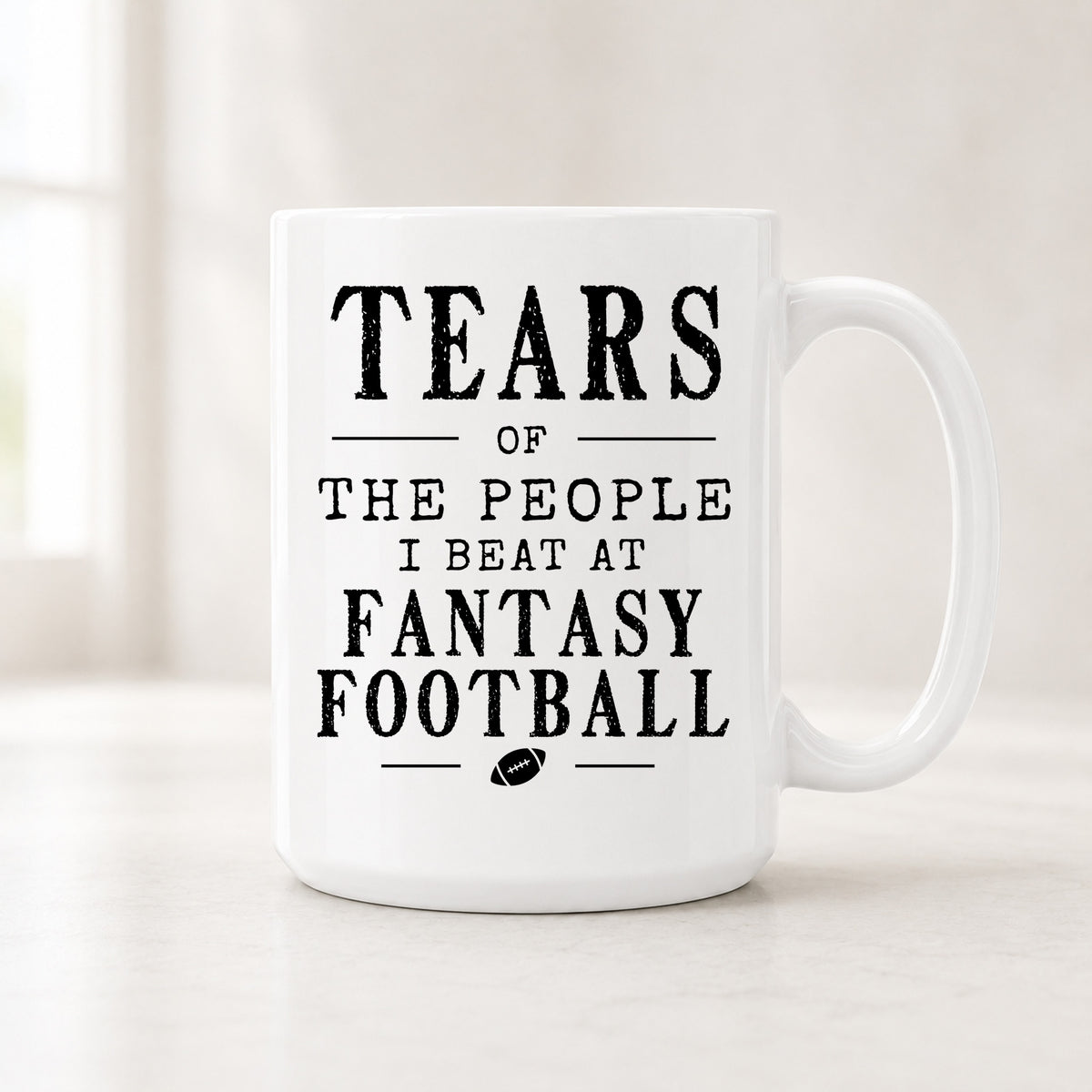 15 oz Tears of the People I Beat at Fantasy Football mug with bold black vintage lettering and a small football icon