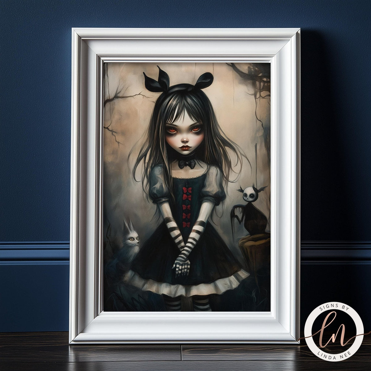 The image is a framed artwork depicting a young girl with long dark hair and a black dress, surrounded by a cat and another small figure, all set against a dark, moody background.