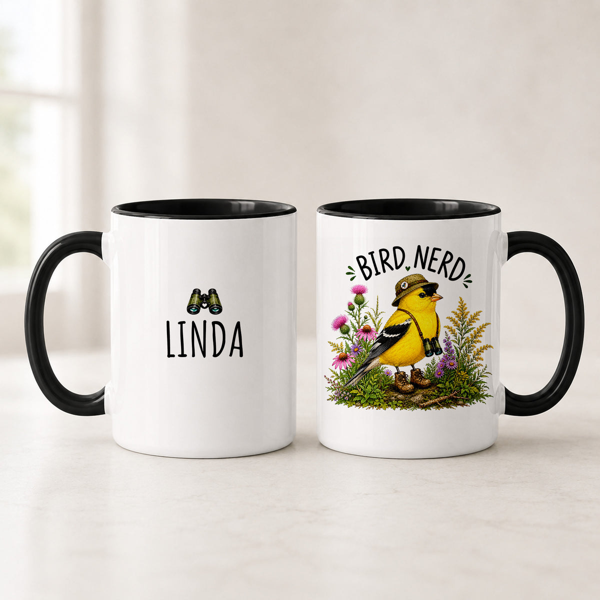 Black handle American Goldfinch Bird Nerd mugs showing the name LINDA under binoculars and the yellow bird