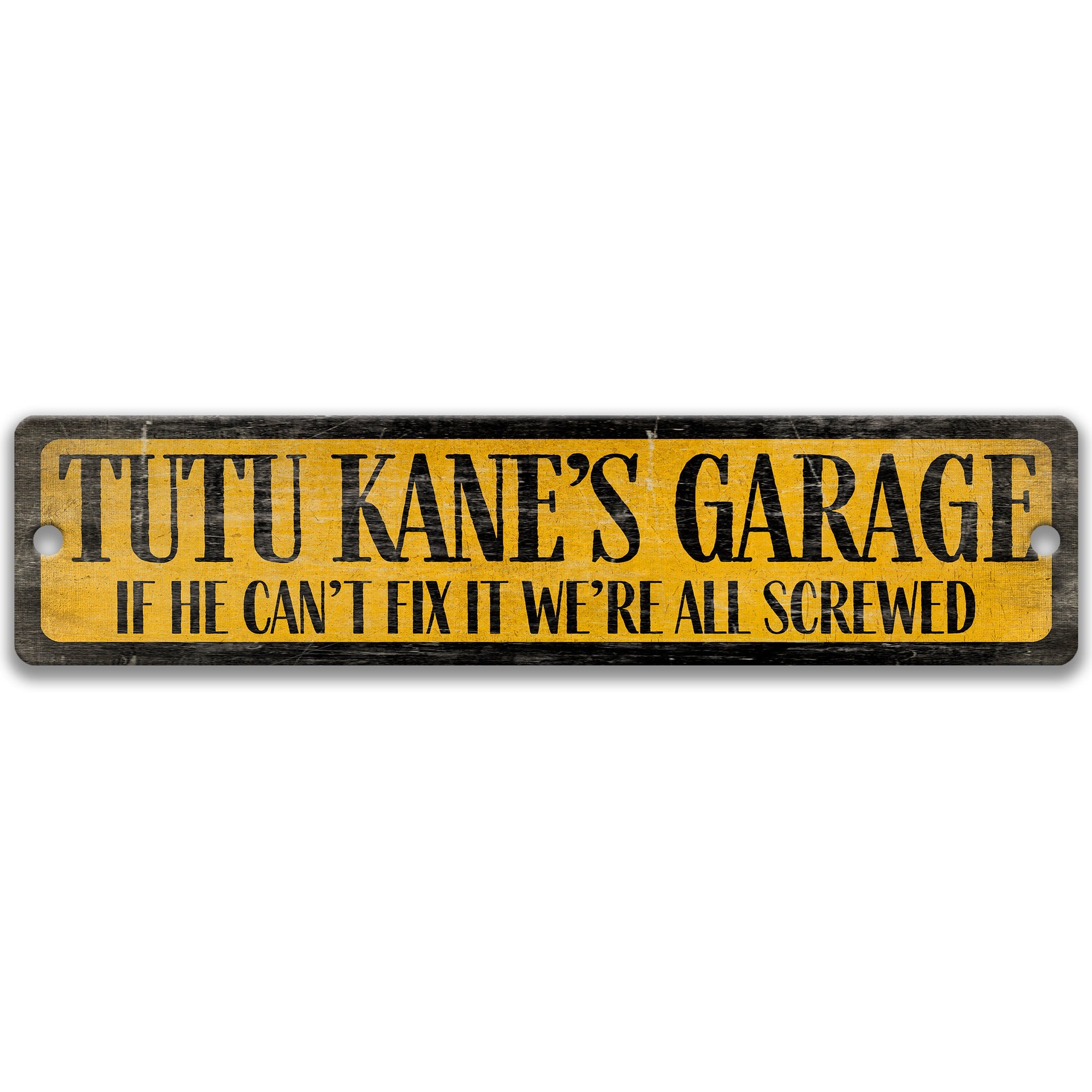 The image is a sign with the text "TUTU KANE'S GARAGE" in black letters on a yellow background.