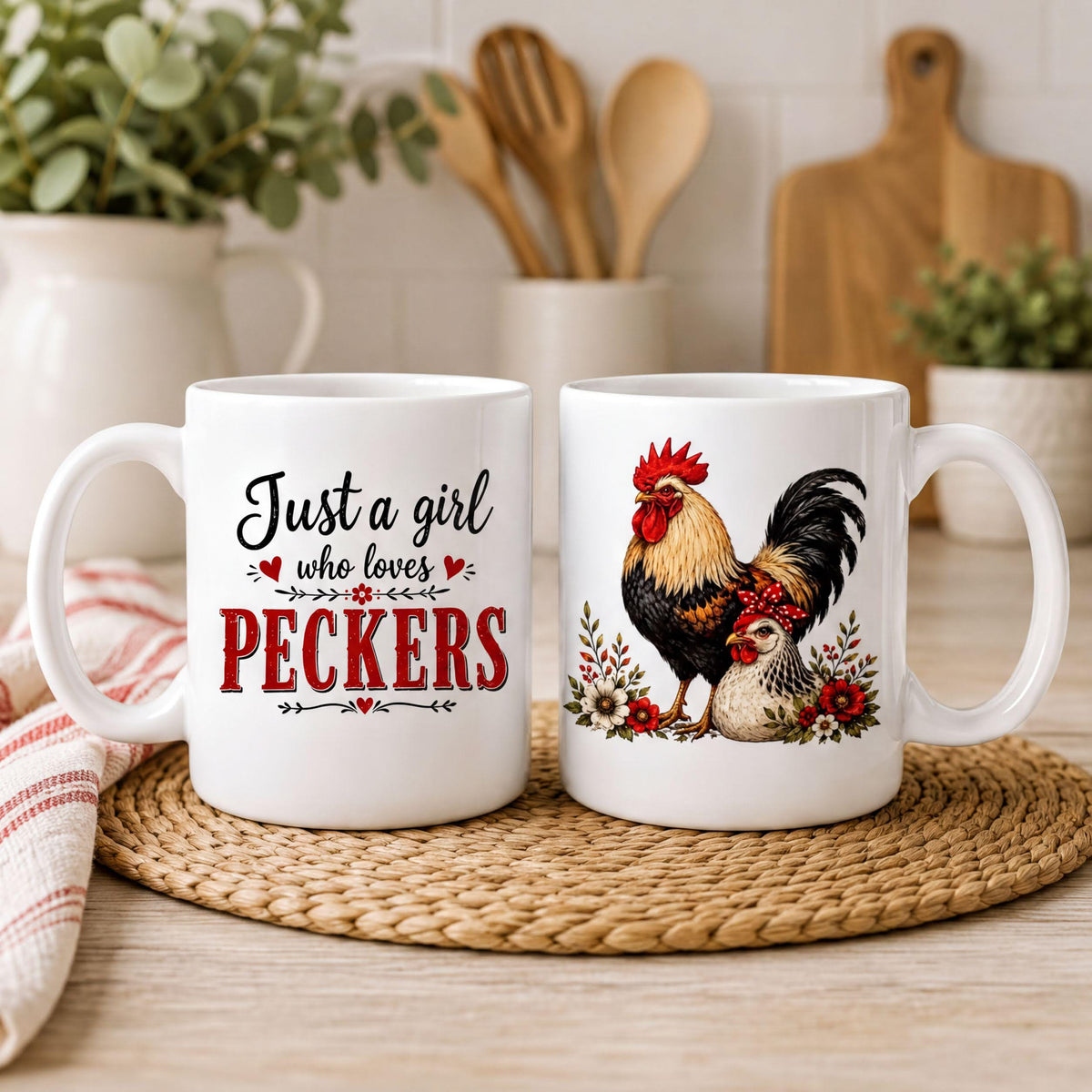 Rooster coffee mug front and back on a woven placemat with wooden spoons, a red striped towel and greenery