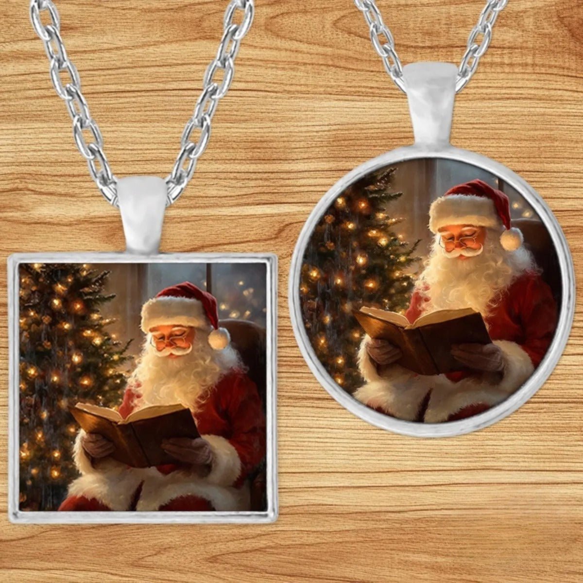 Santa Reading pendant necklace shown in round and square silver charm styles on a wood background