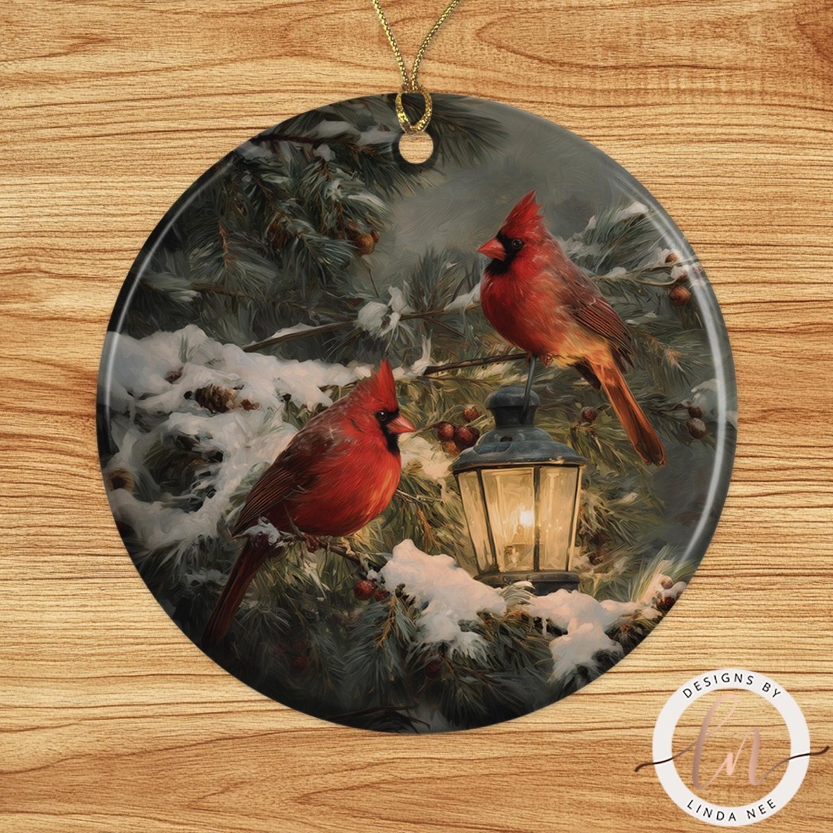 A pair of red cardinals perched on a snowy branch, with a lantern glowing in the background, creating a serene winter scene.