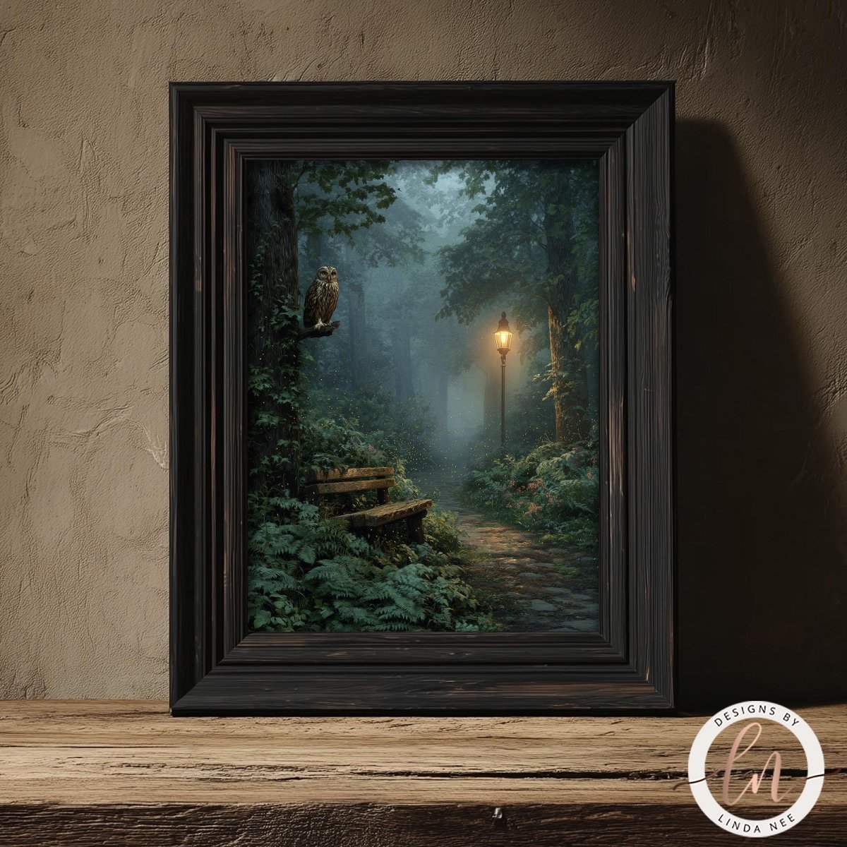 A framed painting depicting a serene forest scene with a path leading through the trees, illuminated by a street lamp in the distance.