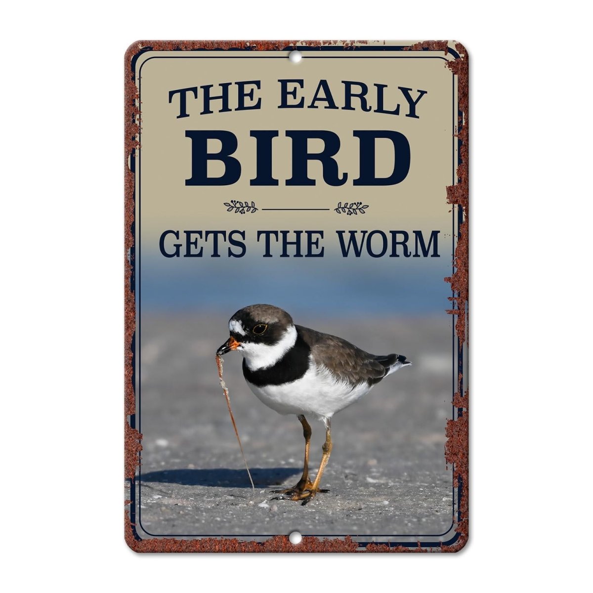 A sign with the text "The early bird gets the worm" and an image of a bird standing on a beach.