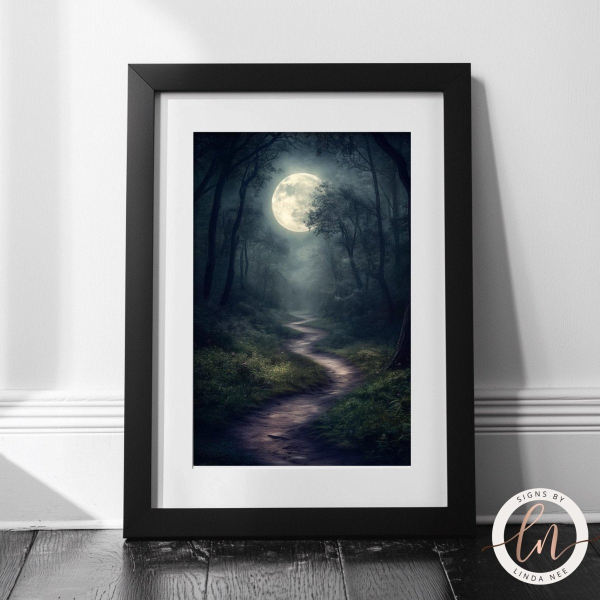Dark forest wall art with a full moon illuminating the path