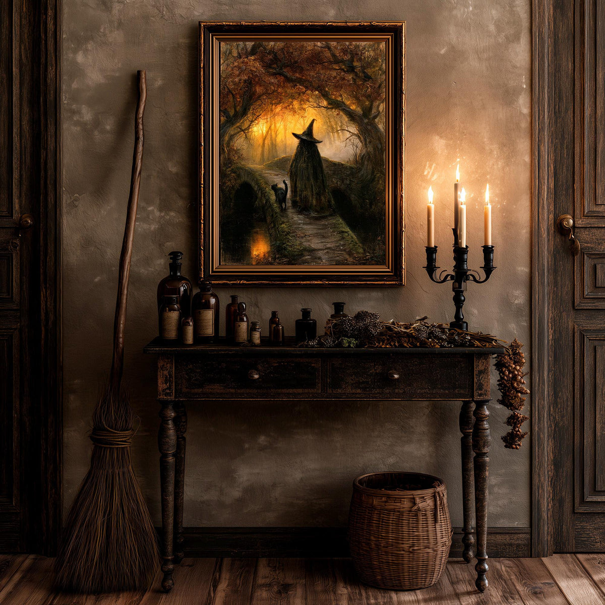 Gothic Halloween wall art above a rustic table with a candelabra, apothecary bottles, and a broom