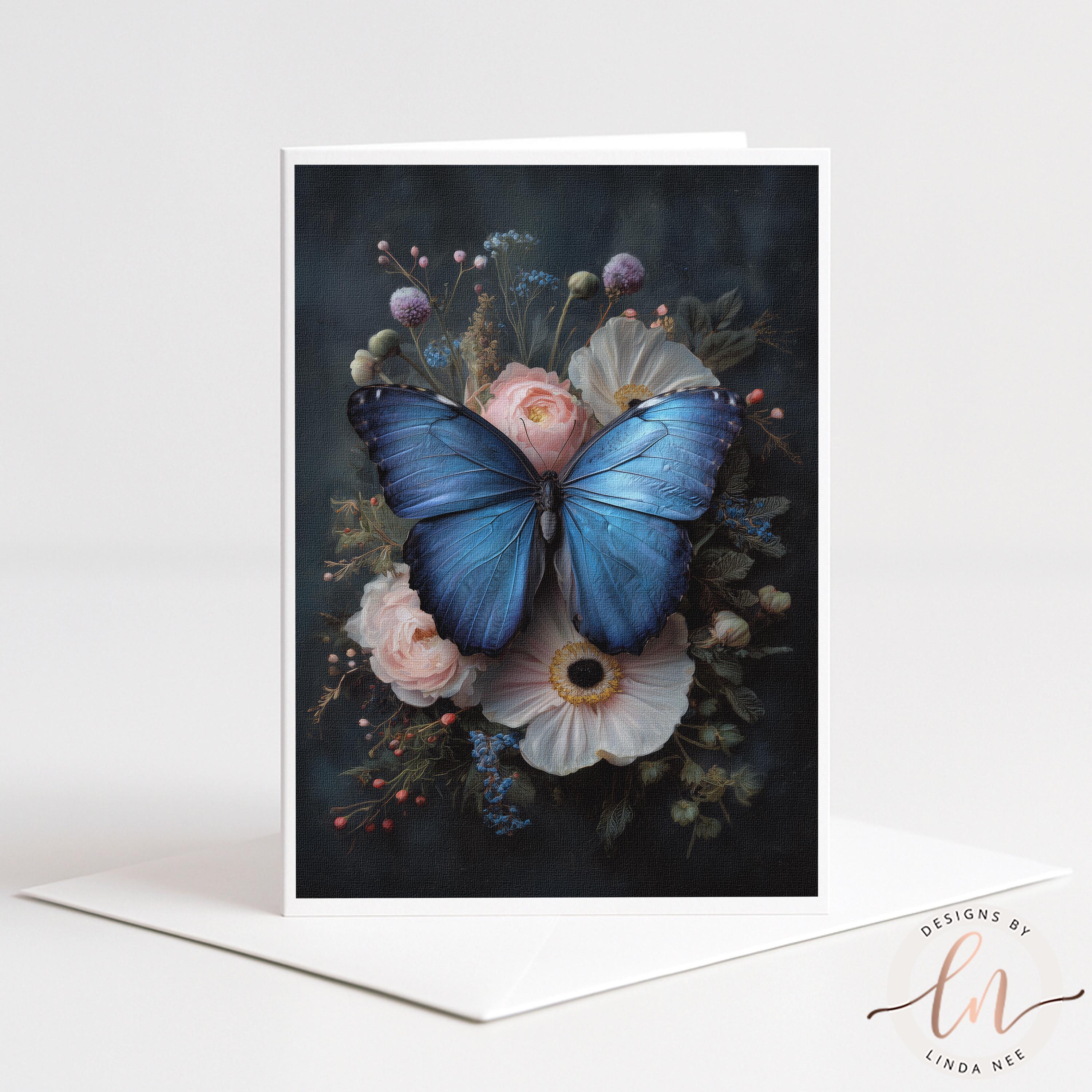 A card featuring a blue butterfly resting on a floral arrangement, with various flowers and foliage surrounding the butterfly.
