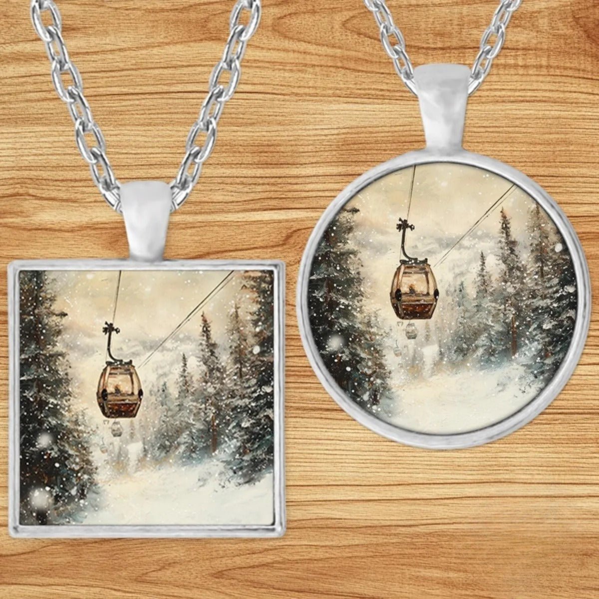 Vintage Ski Lift Gondola pendant necklace shown in round and square silver charm styles on a wood background