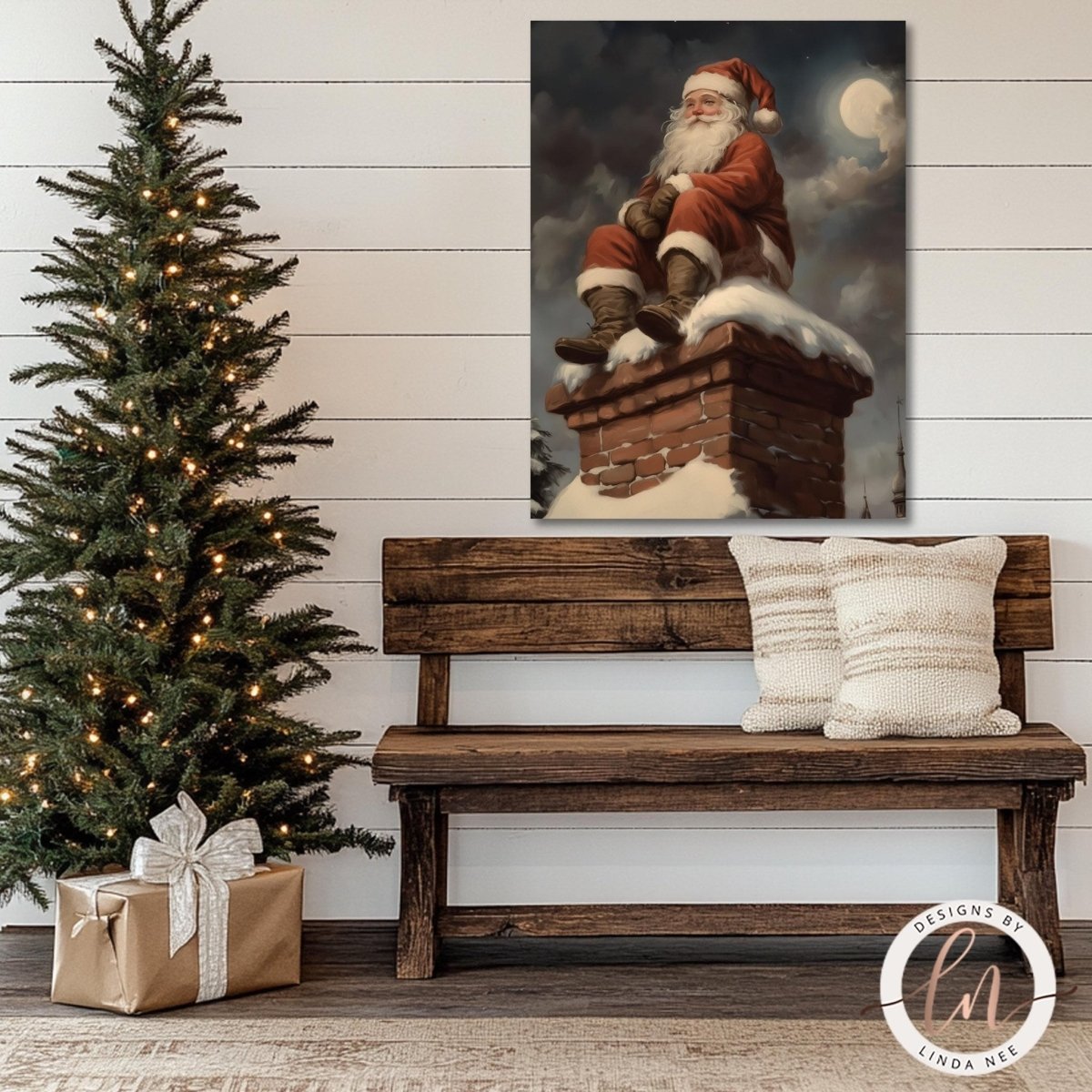 Moonlit Santa print hung above a wooden bench beside a decorated Christmas tree