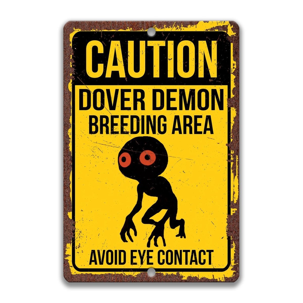 Dover Demon Breeding Area warning sign, rusty distressed finish, bold yellow and black caution design with orange-eyed creature figure