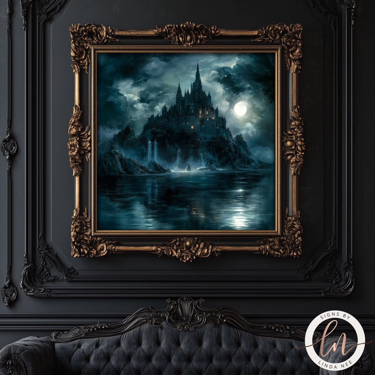 An ornate gold-framed painting of a gothic castle on a dark, misty lake under a full moon, displayed on a black paneled wall above a tufted black sofa. A circular 'Linda Nee Designs' watermark is visible in the bottom right corner.