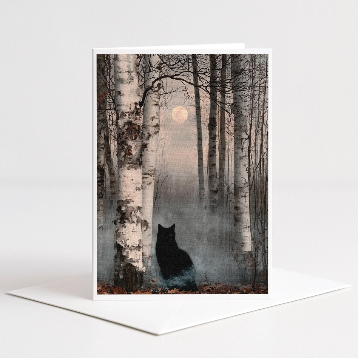 Black cat sitting among pale birch trees under a misty full moon, autumn note card art