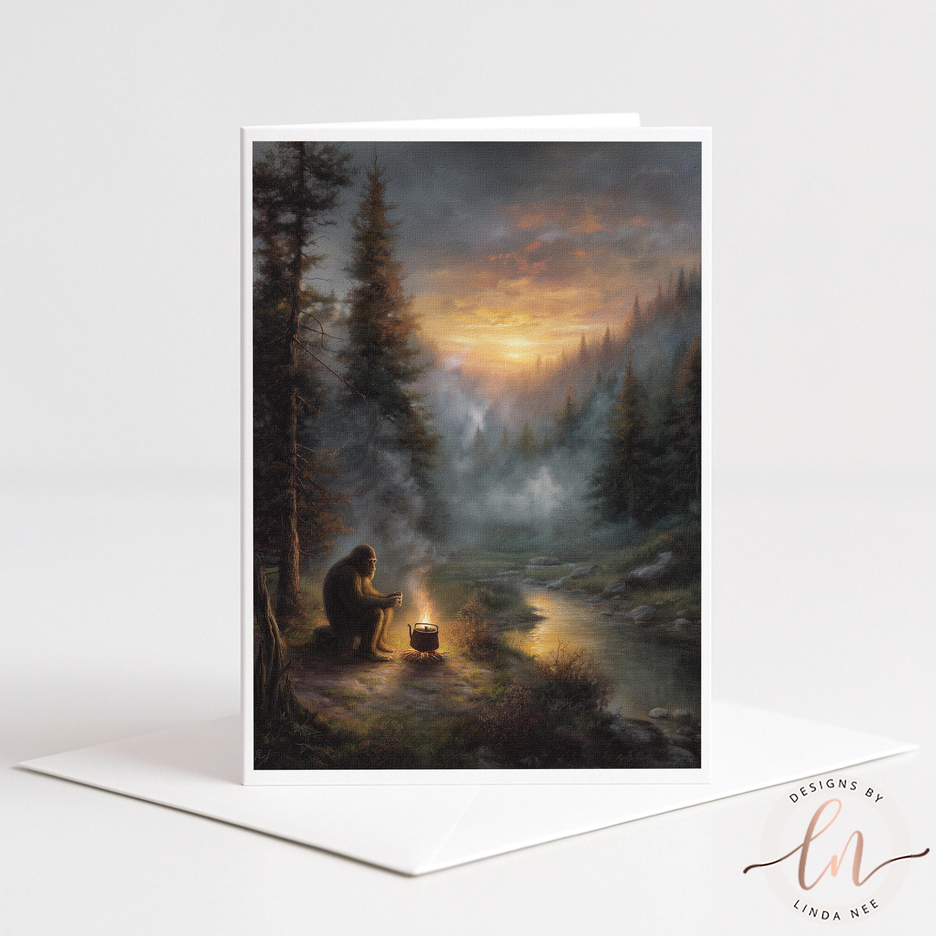 Artwork by Linda Nee featuring Bigfoot sitting beside a campfire and drinking coffee in a misty evergreen forest at sunrise, with warm golden light, a winding stream, and moody woodland atmosphere.