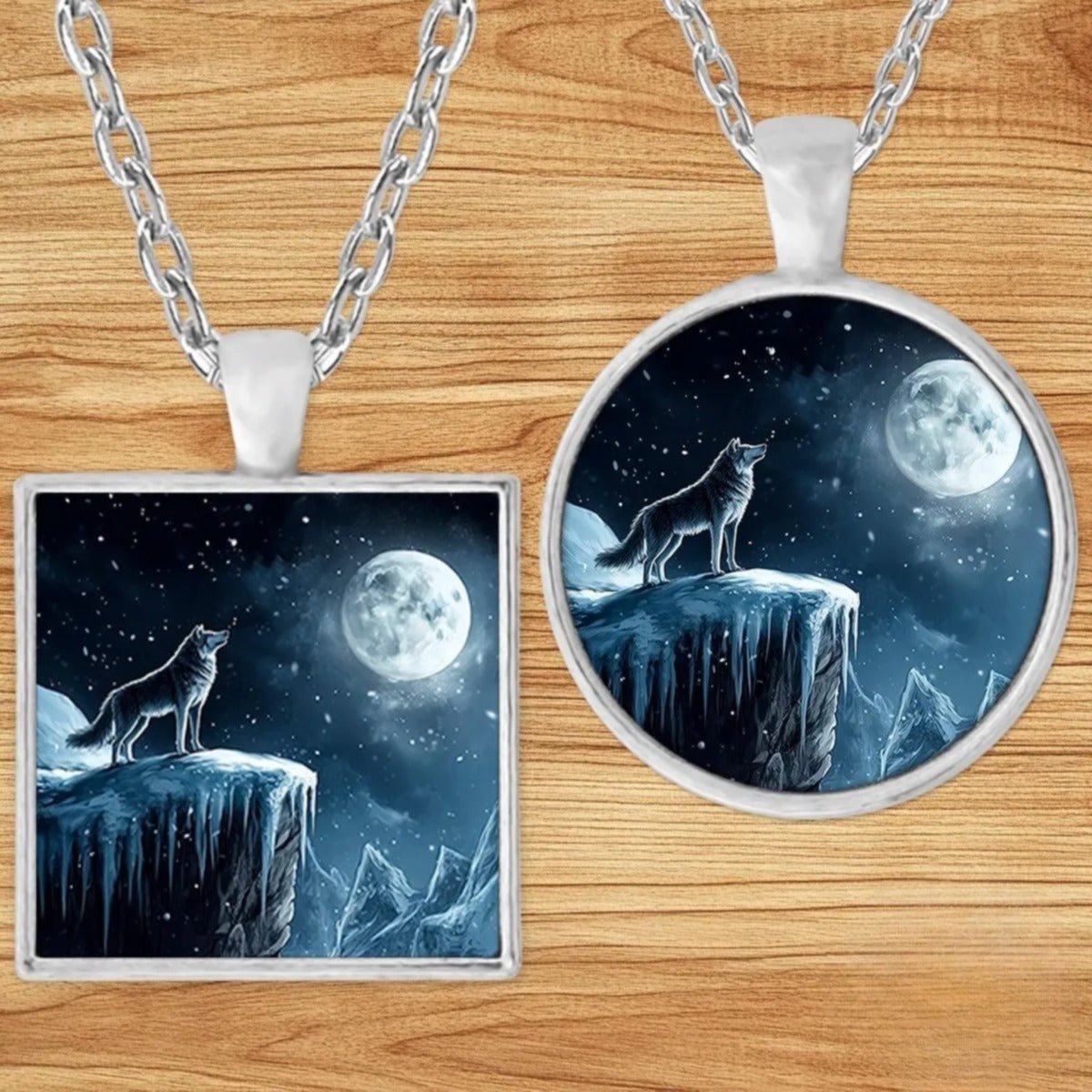 Lone Wolf Moonlight pendant necklace shown in round and square silver charm styles on a wood background