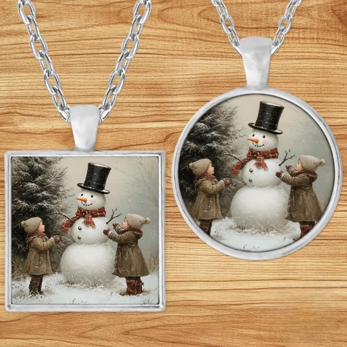 Vintage Children & Snowman pendant necklace shown in round and square silver charm styles on a wood background