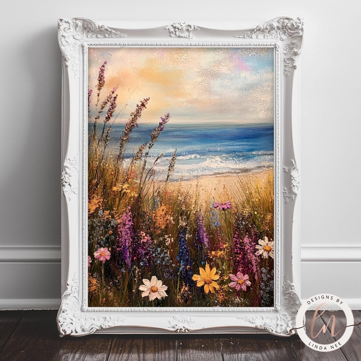 A framed painting depicting a vibrant coastal landscape with a field of colorful wildflowers in the foreground and a serene ocean view in the background.