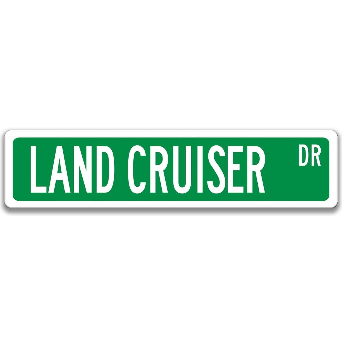 Green street sign with white border, white text reading LAND CRUISER DR