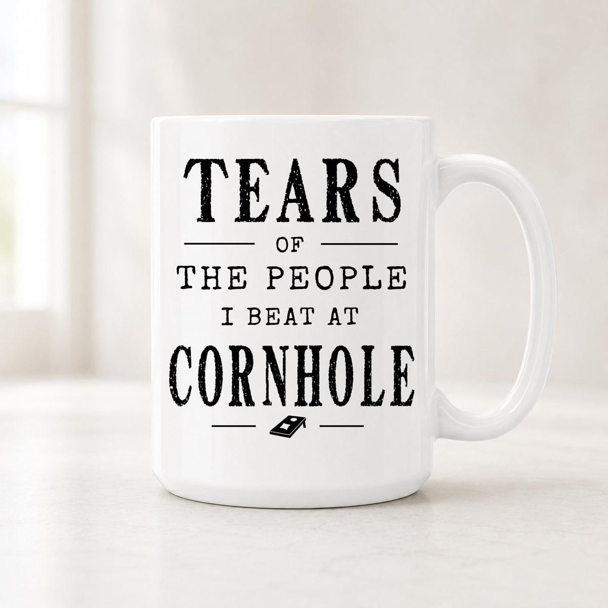15 oz Tears of the People I Beat at Cornhole mug with bold black vintage lettering and a small themed icon