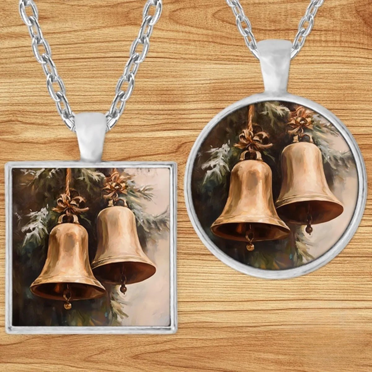 Vintage Christmas Bells pendant necklace shown in round and square silver charm styles on a wood background