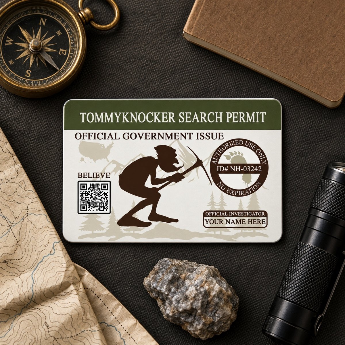 a search permit for a Tommyknocker investigation, along with various items such as a compass, a flashlight, and a rock.