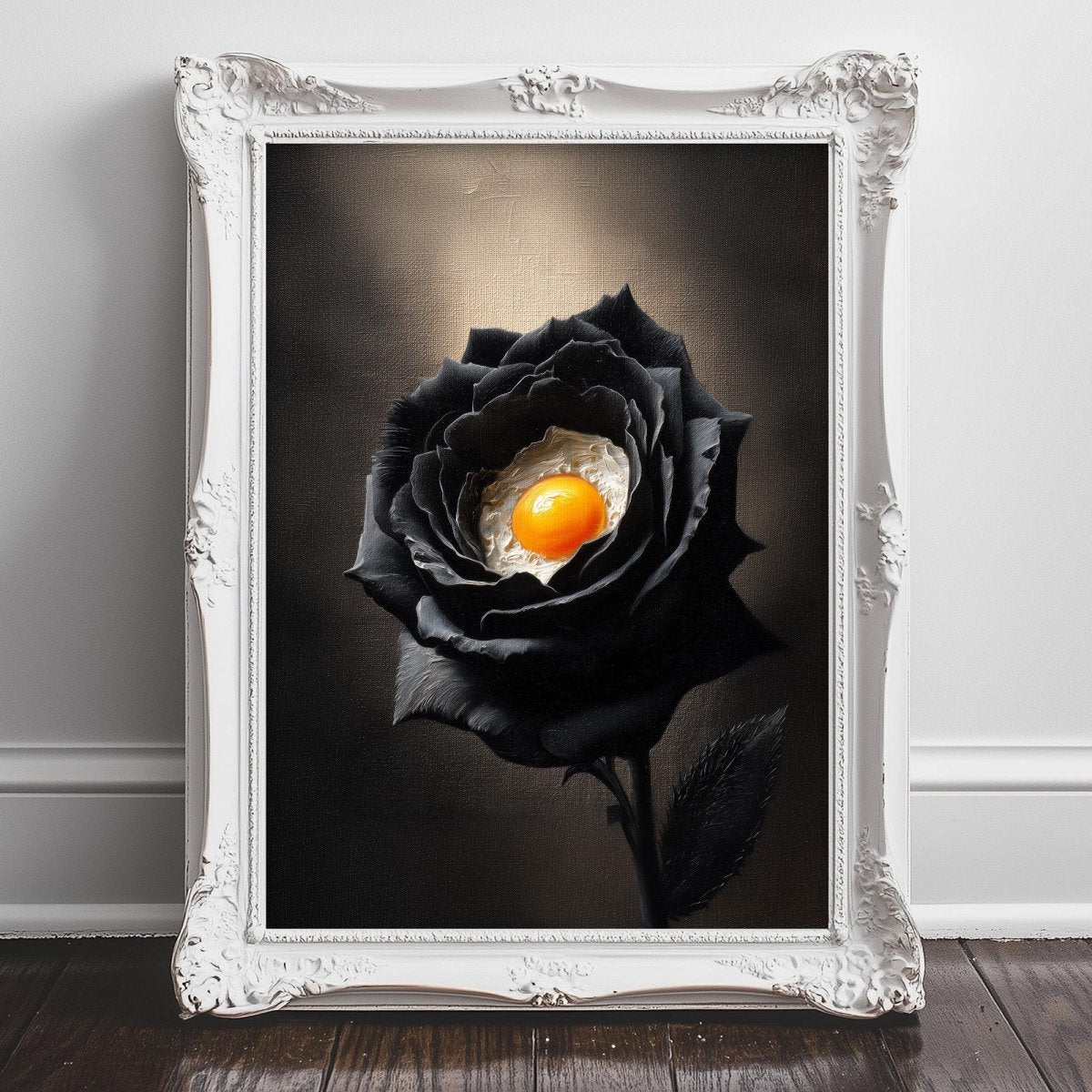 A framed image of a black rose with an orange center, set against a dark background.